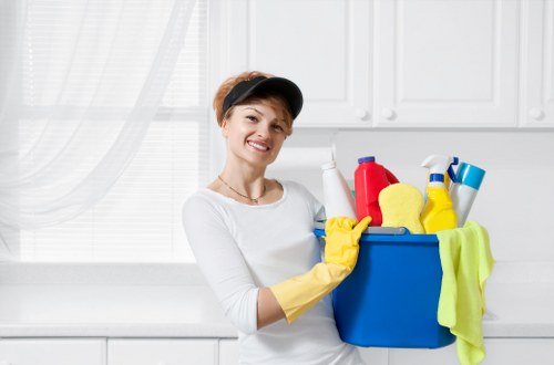 Cleaner in Camberwell following safe cleaning procedures